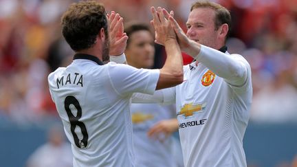 Le duo Juan Mata buteur et Wayne Rooney passeur contre Norwich