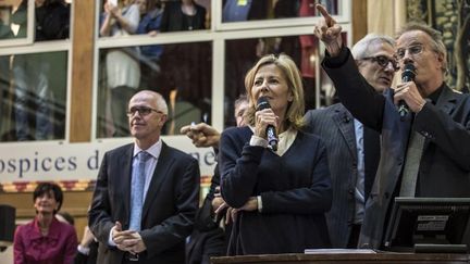 Claire Chazal et Christophe Lambert lors de la vente des vins de Beaune le 15 novembre 2015
 (Jean-Philippe Ksiazek / AFP)