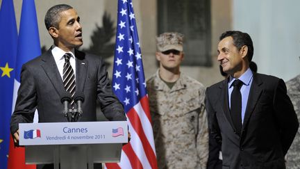 Barack Obama et Nicolas Sarkozy le 4 novembre 2011 &agrave; Cannes, lors d'un sommet du G20. (PHILIPPE WOJAZER / AFP)