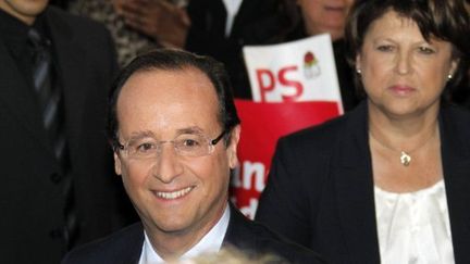 François Hollande, décontracté et souriant lors de son investiture officielle (AFP/JOEL SAGET)