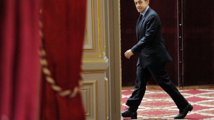 Nicolas Sarkozy dans le jardin d'hiver du Palais de l'Elysée, le 30 septembre 2011. (ERIC FEFERBERG / AFP)