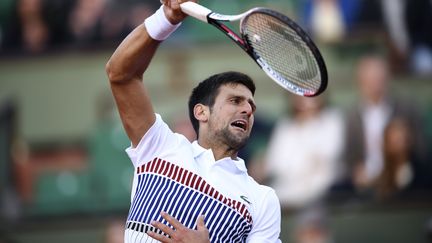 Novak Djokovic en plein effort (ERIC FEFERBERG / AFP)