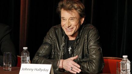 Johnny Hallyday lors d'une conf&eacute;rence de presse &agrave; Paris, le 3 d&eacute;cembre 2011. (AFP / BESTIMAGE)