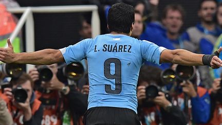 Luis Suarez touché par la grâce (NELSON ALMEIDA / AFP)