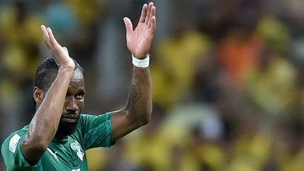 Didier Drogba, à sa sortie du terrain, à l'issue du dernier match de poule des Éléphants lors de la Coupe du Monde 2014. (ARIS MESSINIS / AFP)