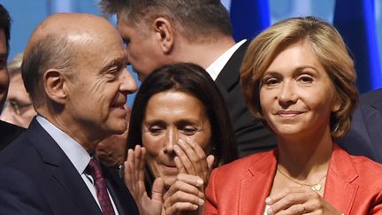 Alain Juppé et Valérie Pécresse, le 27 septembre 2015 à Nogent-sur-Marne (Val-de-Marne) (DOMINIQUE FAGET / AFP)