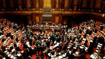 Les sénateurs italiens, le 15 juillet 2010. 170 ont voté en faveur du plan d'austérité, 136 d'entre ont voté contre. (AFP PHOTO/ FILIPPO MONTEFORTE)