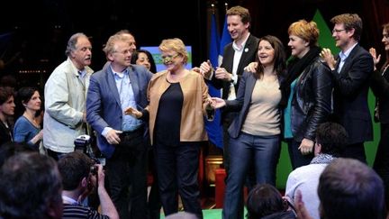 Eva Joly et les dirigeants écologistes au Cirque d'hiver (BERTRAND GUAY / AFP)