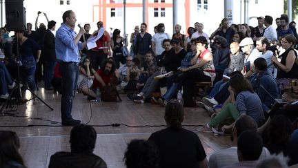 Denis Gravouil, secrétaire général de la CGT Spectacle en juin 2014, lors d'une assemblée générale Parc de La Vilette, Paris
 (STEPHANE DE SAKUTIN / AFP)