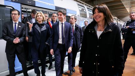 Valérie Pécresse, Anne Hidalgo et Gabriel Attal à l'inauguration de l'extension du RER E, en mai 2024. (THOMAS SAMSON / POOL / MAXPPP)