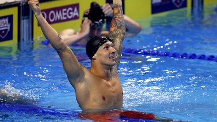 Caeleb Dressel réagit après avoir établi un record américain lors de la finale du 50 mètres nage libre hommes, le 20 juin 2021.&nbsp; (AL BELLO / GETTY IMAGES NORTH AMERICA / Getty Images via AFP)