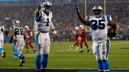 Les deux joueurs des Carolina Panthers, Cam Newton et Mike Tolbert