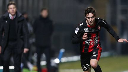 Grégoire Puel sous le regard de son père (VALERY HACHE / AFP)