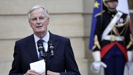 The new Prime Minister, Michel Barnier, during the handover of power at the Hôtel de Matignon, in Paris, on September 5, 2024. (STEPHANE DE SAKUTIN / POOL / AFP)