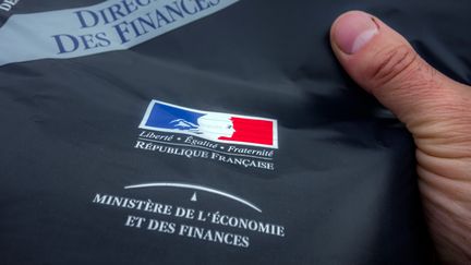 Moins de la moiti&eacute; des m&eacute;nages fran&ccedil;ais sont soumis &agrave; l'imp&ocirc;t sur le revenu en 2014, une premi&egrave;re depuis 1996. (PHILIPPE HUGUEN / AFP)