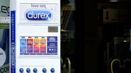 A condom dispenser in front of a pharmacy. (G?RARD HOUIN / MAXPPP)