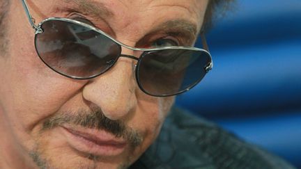 Johnny Hallyday, en conf&eacute;rence de presse &agrave; Moscou (Russie), le 25 mai 2012. (VITALIY BELOUSOV / RIA NOVOSTI / AFP)