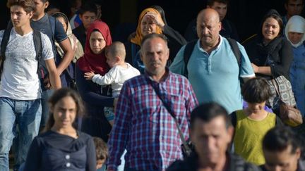 Réfugiés syriens au port d'Athènes en août 2015. (AFP / Christos Stamos)