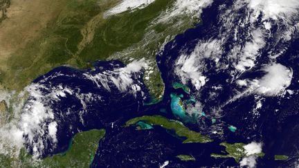 Carte satellite centrée sur les Antilles, réalisée le 28 septembre 2016, qui&nbsp;montre l'arrivée de la tempête tropicale Matthew.&nbsp; (NOAA-NASA GOES PROJECT / AFP)