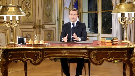 Emmanuel Macron s'adresse aux Français depuis l'Elysée lors de la crise des "gilets jaunes", le 10 décembre 2018. (Ludovic MARIN / AFP)