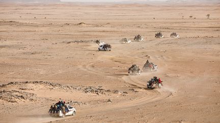 Au Niger,&nbsp;chaque semaine, plus de 100 voitures chargées de jeunes Nigériens et Africains de l’Ouest traversent l’immense désert du Ténéré et affrontent tous les dangers afin de se rendre en Libye.&nbsp;Avec l’autorisation de Pascal Maitre / National Geographic.Reportage publié par "National Geographic Magazine" (juillet 2019). (PASCAL MAITRE / NATIONAL GEOGRAPHIC)