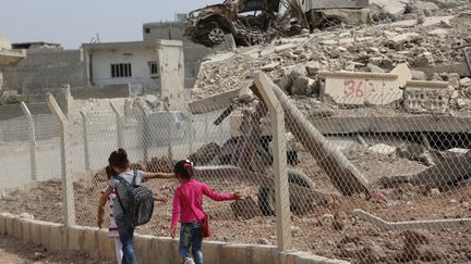 Des enfants à Kobane, dans le Kurdistan syrien, en 2015 (photo d'illustration). (DELIL SOULEIMAN / AFP)