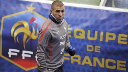 Pour Karim Benzema, l'objectif est d'abord de sortir des poules avant de penser à la victoire finale  (FRANCK FIFE / AFP)