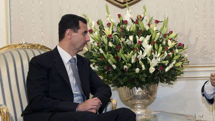 Bachar Al-Assad (&agrave; g.), le 12 Juillet 2010 &agrave; Tunis (Tunisie), avec le pr&eacute;sident tunisien Ben Ali. (AFP)