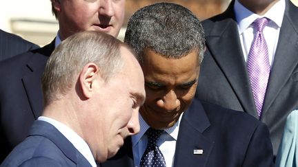 Le pr&eacute;sident russe Vladimir Poutine (G) et le pr&eacute;sident am&eacute;ricain Barack Obama, le 6 septembre 2013 au sommet du G20 &agrave; Saint-P&eacute;tersbourg (Russie). (KEVIN LAMARQUE / REUTERS )