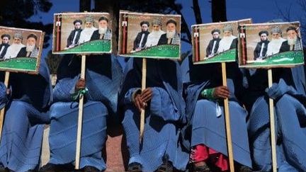 Hérat, Afghanistan, le 25 mars 2014. Supportrices de candidats a l'élection présidentielle du 5 avril 2014.
 (TOPSHOTS/AFP PHOTO/AREF KARIMI)