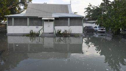 L'ouragan Béryl a provoqué des inondations à Worthing (La Barbade), endommageant des infrastructures comme ce commerce, le 1er juillet 2024. (RANDY BROOKS / AFP)