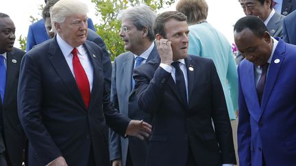 Donald Trump et Emmanuel Macron, 27 mai 2017, à Taormina, en Sicile. (PHILIPPE WOJAZER / POOL)