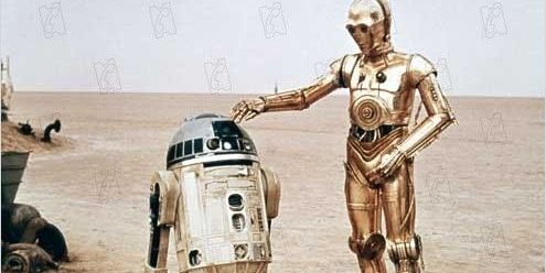 R2-D2 et C3-PO perdus sur la planète Tatooïne dans "La Guerre des étoiles - Un nouvel espoir" (1977) de George Lucas
 (LucasFilms )