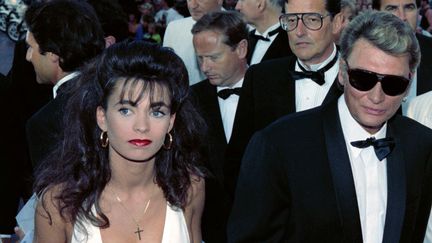 Johnny Hallyday et Adeline Blondieau à Cannes en 1990
 (AFP)