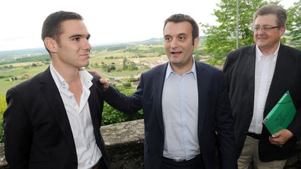 De g. &agrave; dr. : Etienne Bousquet-Cassagne, le candidat FN dans la 3e circonscription du Lot-et-Garonne, Florian Philippot, le vice-pr&eacute;sident du FN, et Michel Guiniot, le directeur de campagne du candidat, le 19 juin &agrave; Monflanquin. (MEHDI FEDOUACH / AFP)