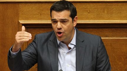 Le Premier ministre grec, Alexis Tsipras, s'adresse &agrave; l'Assembl&eacute;e nationale &agrave; Ath&egrave;nes, le 14 ao&ucirc;t 2015. (AYHAN MEHMET / ANADOLU AGENCY/AFP)