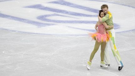 Nathalie Péchalat et Fabien Bourzat rêvent de séduire le jury de Sotchi.  (TORU YAMANAKA / AFP)