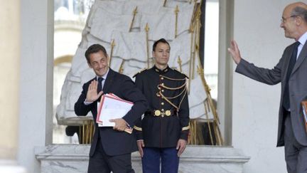 Nicolas Sarkozy et Alain Juppé (AFP)