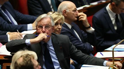 Le Premier ministre Michel Barnier pendant les questions au gouvernement à l'Assemblée nationale, le 22 octobre 2024. (ALAIN JOCARD / AFP)