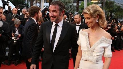 Jean Dujardin et Alexandra Lamy arrivent au Palais des Festivals
 (AFP)