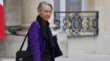 La ministre du Travail, Elisabeth Borne, à l'Elysée (Paris), le 15 décembre 2021.&nbsp; (LUDOVIC MARIN / AFP)