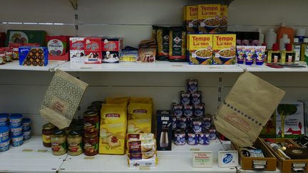 Reconstitution d'une épicerie est-allemande à l'occasion d'un évènement organisé à Berlin autour de la projection du film "Good Bye Lenin" (1er mai 2017)
 (John MacDougall / AFP)