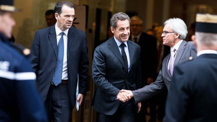 Nicolas Sarkozy sort de l'Assembl&eacute;e nationale apr&egrave;s un d&eacute;jeuner, le 15 novembre 2013. (©FRANCOIS LAFITE/WOSTOK PRESS / MAXPPP)