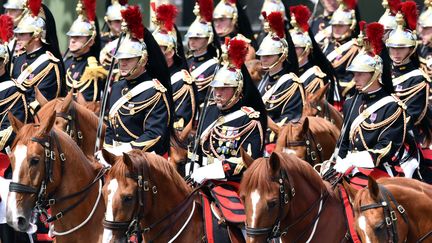 La Garde Républicaine défile le 14 juillet 2017 sur les Champs Elysées (MUSTAFA YALCIN / ANADOLU AGENCY)