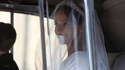 L'actrice américaine Meghan Markle en route pour la chapelle St George du château de Windsor, le 19 mai 2018.&nbsp; (ALASTAIR GRANT / AFP)