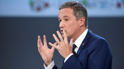 Nicolas Dupont-Aignan, candidat de Debout la France, durant un meeting à Paris, le 21 février 2017. (Photo d'illustration) (LIONEL BONAVENTURE / AFP)