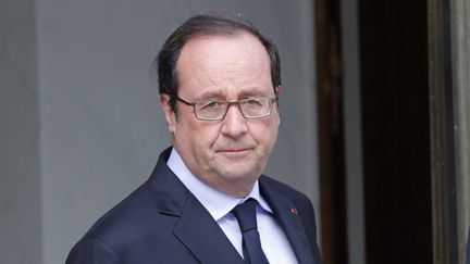 &nbsp; (François Hollande à la sortie de la réunion de crise à l'Elysée, ce mardi matin © REUTERS/Philippe Wojazer)