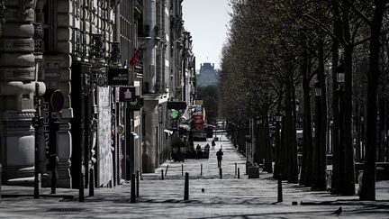 Les Champs-Elysées, dans le 8e arrondissement de Paris. (PHILIPPE LOPEZ / AFP)