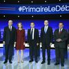 Les sept candidats à la primaire à droite (de gauche à droite : Bruno Le Maire, Alain Juppé,&nbsp;Nathalie Kosciusko-Morizet, Nicolas Sarkozy,&nbsp;Jean-François Copé, Jean-Frédéric Poisson et François Fillon), le 13 octobre 2016, lors du premier débat de la primaire à droite. (MARTIN BUREAU / AFP)