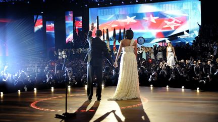 Barack Obama et Michelle Obama avec la chanteuse Beyoncé, le 20 janvier 2009. (JOANN DOST / AFP)